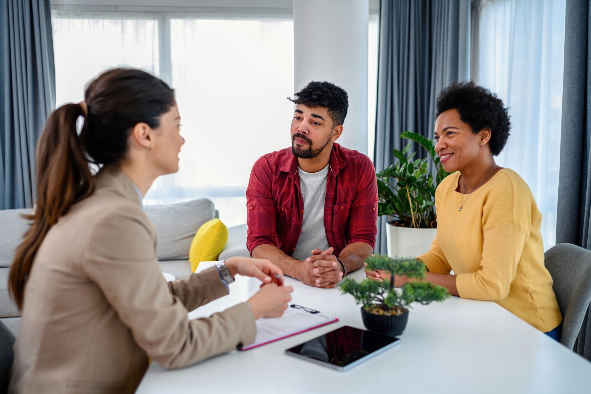 Black couple with a financial advisor Black couple with a financial advisor